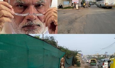 અરે સાહેબ, આ તો આપણા લોકો છે, એમનાથી પડદો શા માટે ? PM મોદીનાં રોડ શો વાળા રૂટ ઉપર ઝૂંપડા ઢાંકી દેવાયા...